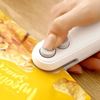 ✨NEW YEAR SALE🤩2-in-1 Rechargeable Magnetic Snack Sealer Household Mini Sealing Machine